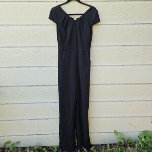NWT Lulu's Goal Getter black short sleeve jumpsuit with pockets medium